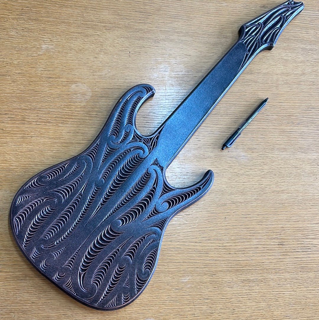 Carved Puhoro Guitar Wall Art - Revolution Aotearoa